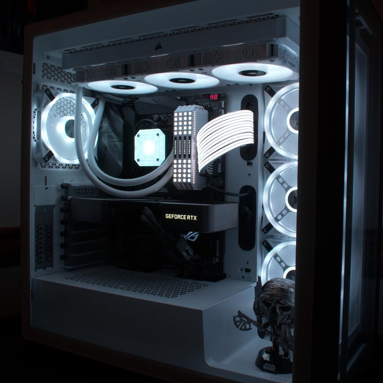 a glowing white custom built computer