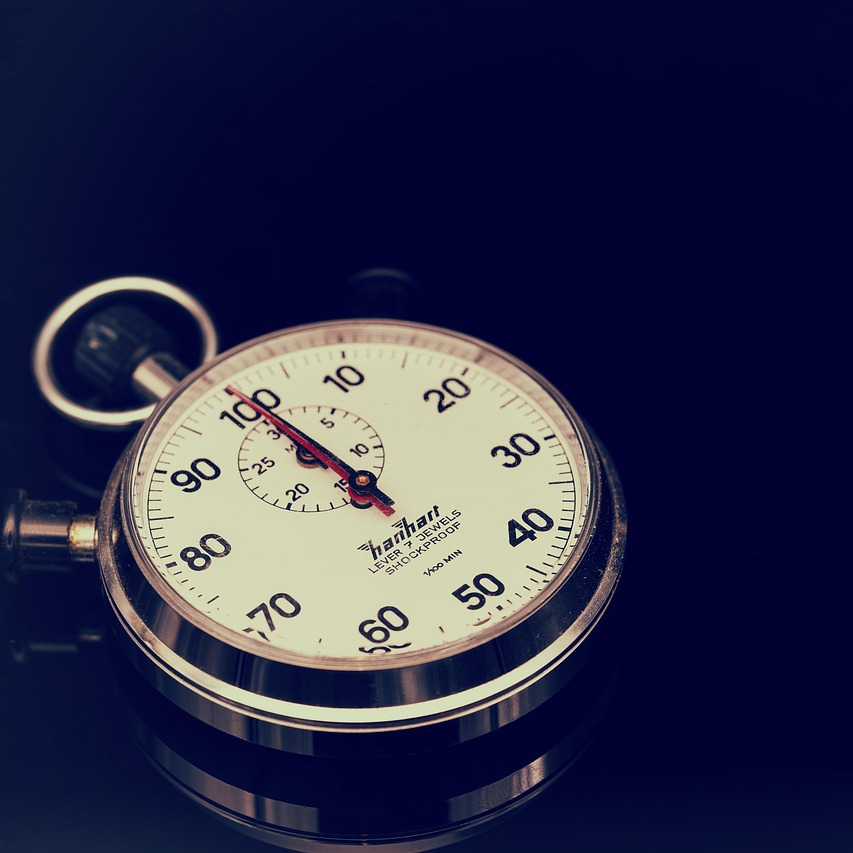 a stopwatch on a black background